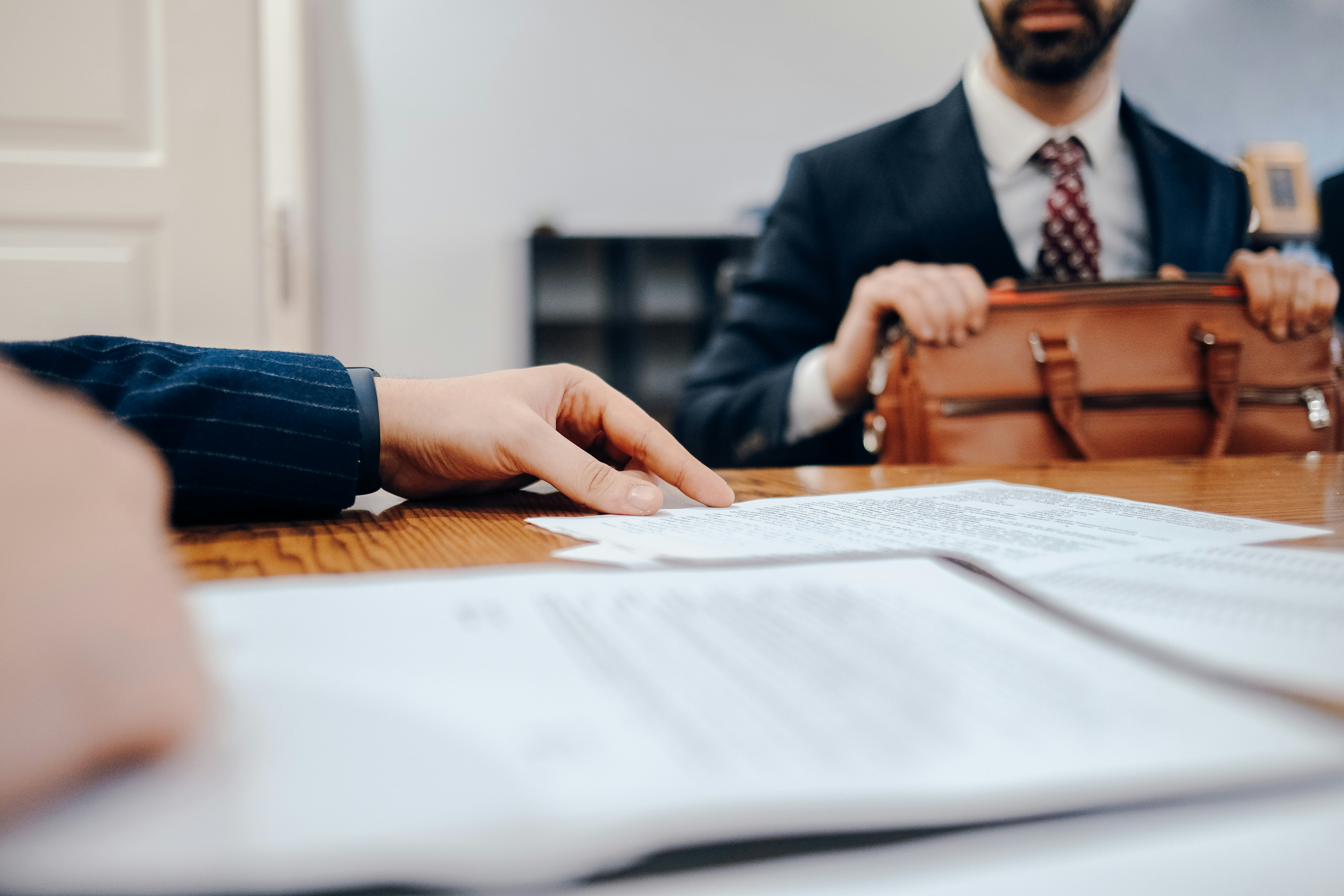 Papers on table in business meeting